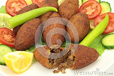 Turkish cuisine, stuffed meatballs with bulgur - ( icli kofte ) Stock Photo