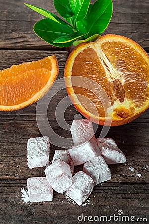 Turkish Delight, eastern delicacy with orange slices Stock Photo