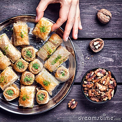 Turkish delights baklava on wooden table Stock Photo