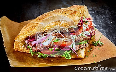 Turkish doner kebab on golden toasted pita bread Stock Photo