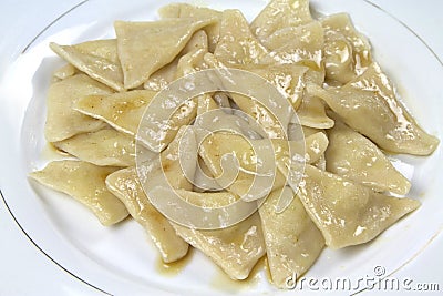 Turkish homemade manti, with potato and buttery ( Hingel - Sivas manti ) Stock Photo