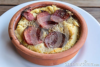 Turkish hummus with sujuk sausage Stock Photo