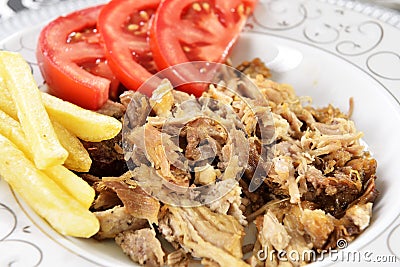 Turkish kebab with french fries and tomatoes Stock Photo