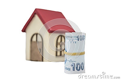 Turkish Lira banknotes and small wooden house Stock Photo