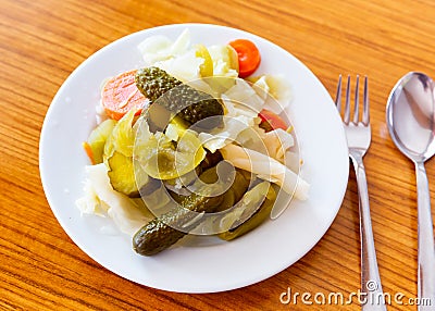 Turkish pickles made with cucumber, cabbage and carrots closeup Stock Photo