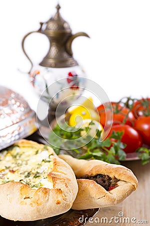 Turkish Pide garnished with vegetables Stock Photo