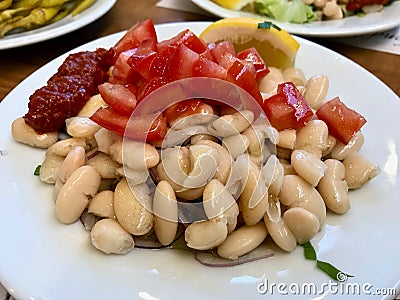 Turkish Piyaz Salad with Onions and Tomatoes. Traditional Salad Stock Photo