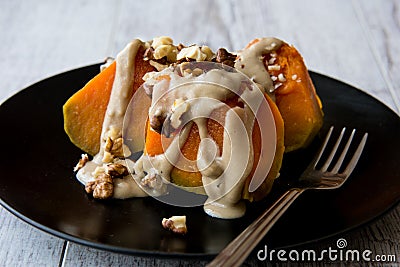 Turkish Pumpkin Dessert with Tahini / Kabak Tatlisi Stock Photo