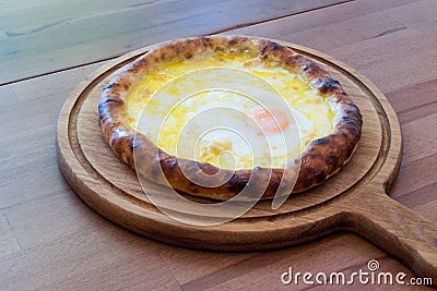 Turkish Round Pide with Fried Egg and Cheese Stock Photo