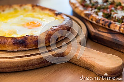 Turkish Round Pide with Fried Egg and Cheese Stock Photo