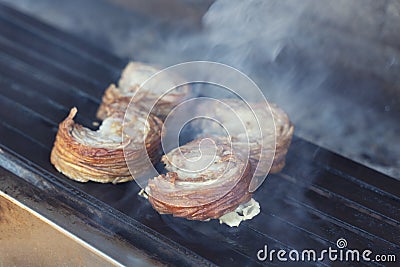 Turkish Street Food Kokorec rolls made with lamb bowel roasting Stock Photo