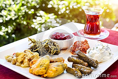 Turkish tea and meze in restaurant Stock Photo