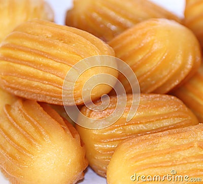 Turkish tulumba sweet or Turkish dougnhuts, macro shot Stock Photo