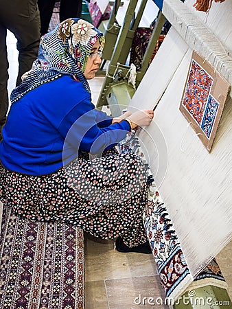 Turkish Woman Making a Carpet Editorial Stock Photo