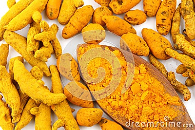 Turmeric barks with spoon of turmeric powder Stock Photo