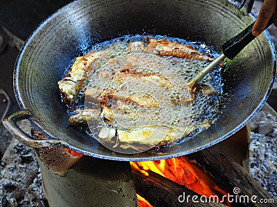 Turmeric fried mackerel Stock Photo