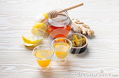 Turmeric lemon honey beverage Stock Photo