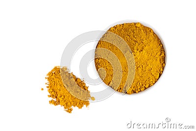 Turmeric powder in white ceramic bowl Stock Photo