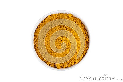 Turmeric powder in white ceramic bowl Stock Photo