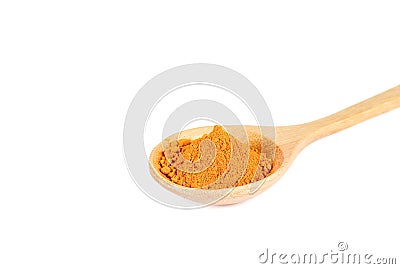 Turmeric powder in wooden spoon on white background. Stock Photo