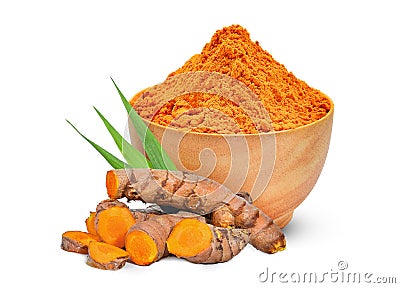 Turmeric root and turmeric powder in the wood bowl Stock Photo