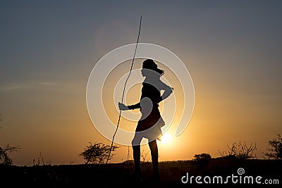 Turmi, Omo Valley, Ethiopia, Hamer tribe September 2018 unidentified people from the tribe at sunset. Editorial Stock Photo