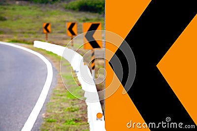 Turn left road warning sign Stock Photo