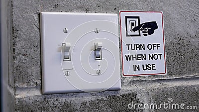 Turn off light switch by saving power concept Stock Photo