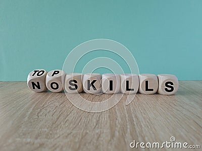 Turned dices and changes the expression no skills to top skills. Stock Photo
