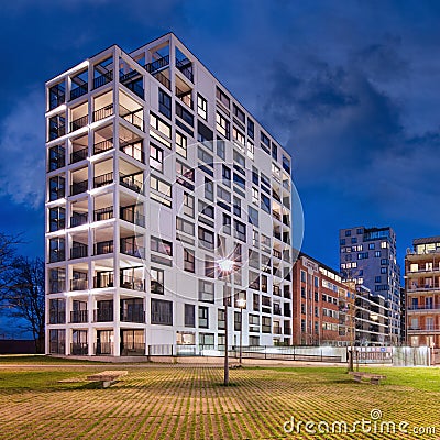 Apartment building at night at New Kaai area in Turnhout, Flanders, Belgium Editorial Stock Photo