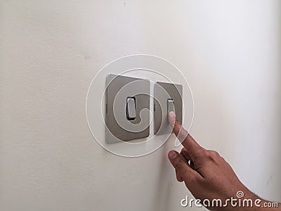 Turning On Electrical Switch Stock Photo