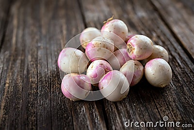 Turnips, beets on rustic wooden background Stock Photo