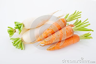 Turnips and carrots heaps Stock Photo