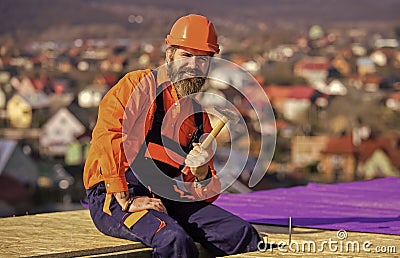 turnkey project. new roof under construction residential building. builder hammer. professional master repair roof. Flat Stock Photo