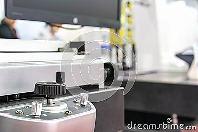 Turns dial switch control at panel for accuracy adjust parameter of machine Stock Photo
