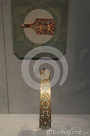 turquise-inlaid bronze belt hook warring states period Editorial Stock Photo