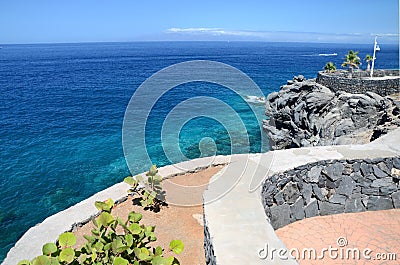 Turquoise bay and volcanic cliffs in Callao Salvaje on Tenerife Stock Photo