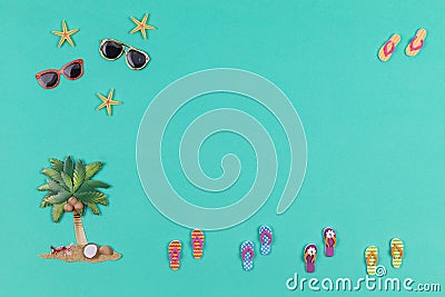 Turquoise beach scene with sandals , palm tree and sunglasses flatlay Stock Photo