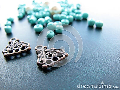 Turquoise beads and pieces of earrings, handmade jewelry Stock Photo