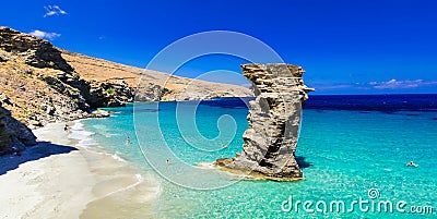 Turquoise beautiful beaches of Greece - Andros, Tis Grias To Pidima with famous rock Stock Photo