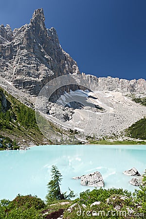 Turquoise Blue Mountain Lake Stock Photo
