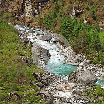 Turquoise colored river Dudh Kosi. Stock Photo