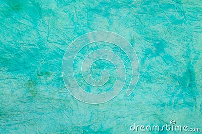 Turquoise creased colored tissue paper background texture Stock Photo