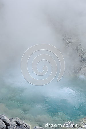 Turquoise hot boiling water in geyser in mountain valley at Tamagawa Onsen Hot spring in Semboku city, Akita prefecture, Tohoku Stock Photo