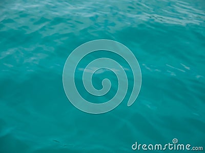 Turquoise sea wave splashing overboard Stock Photo