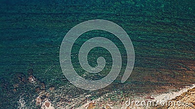 Turquoise sea waves rippling under summer sunlight aerial view. Clear blue ocean Stock Photo