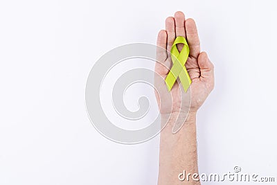 Turquoise or teal ribbon over palm. White background Stock Photo