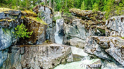 The turquoise water of the Lillooet River cascading down Nairn Falls Stock Photo