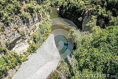 The Rangitikei river flowing through the cliffs and rock walls in the canyons and gorges in the Manawatu Region of New Zealand Stock Photo