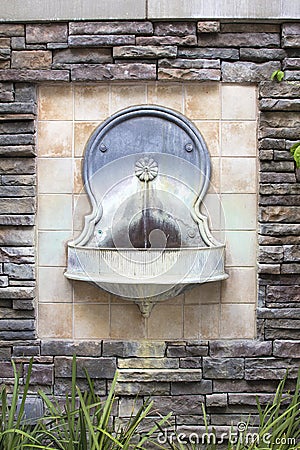 Tuscan Style Wall Water Fountain Stock Photo